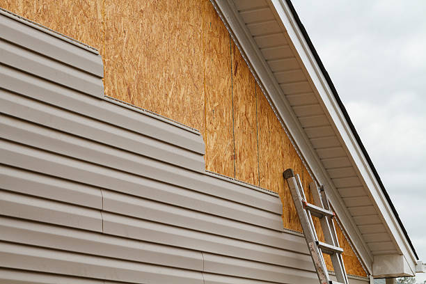 Professional Siding Contractor technician working in Home, PA